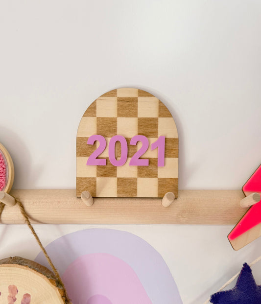 Checkerboard arch year plaque