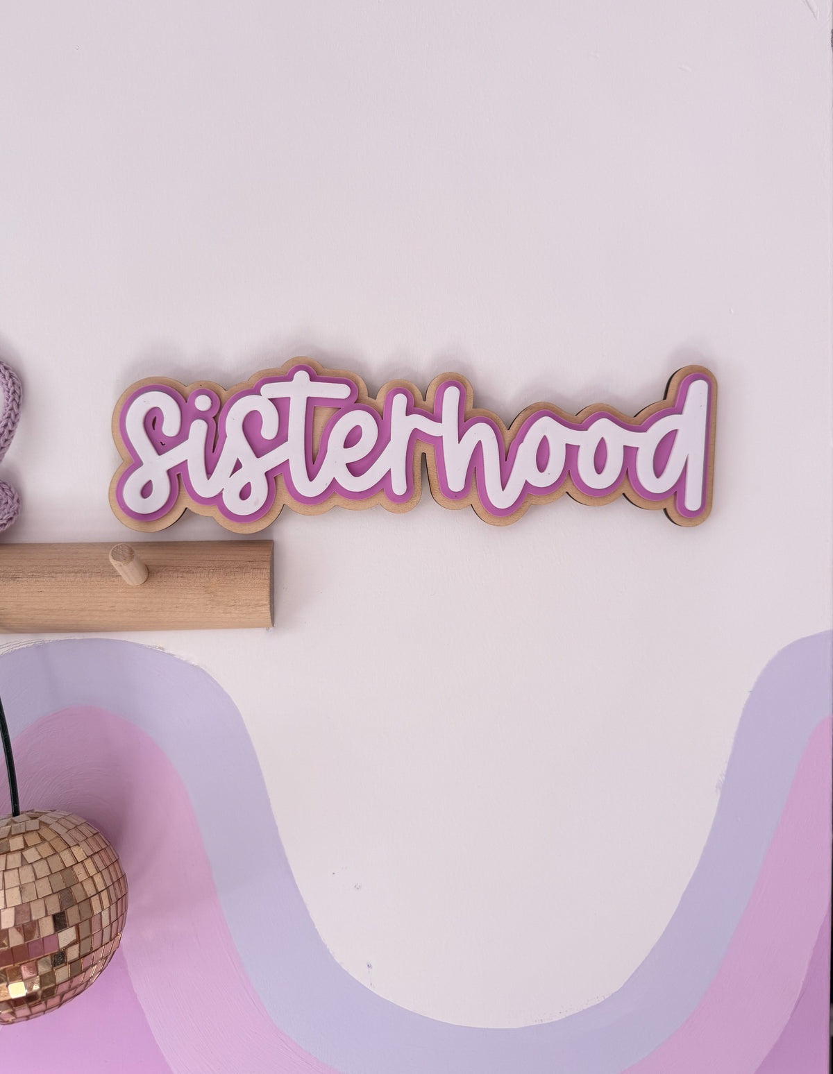 SISTERHOOD wall sign